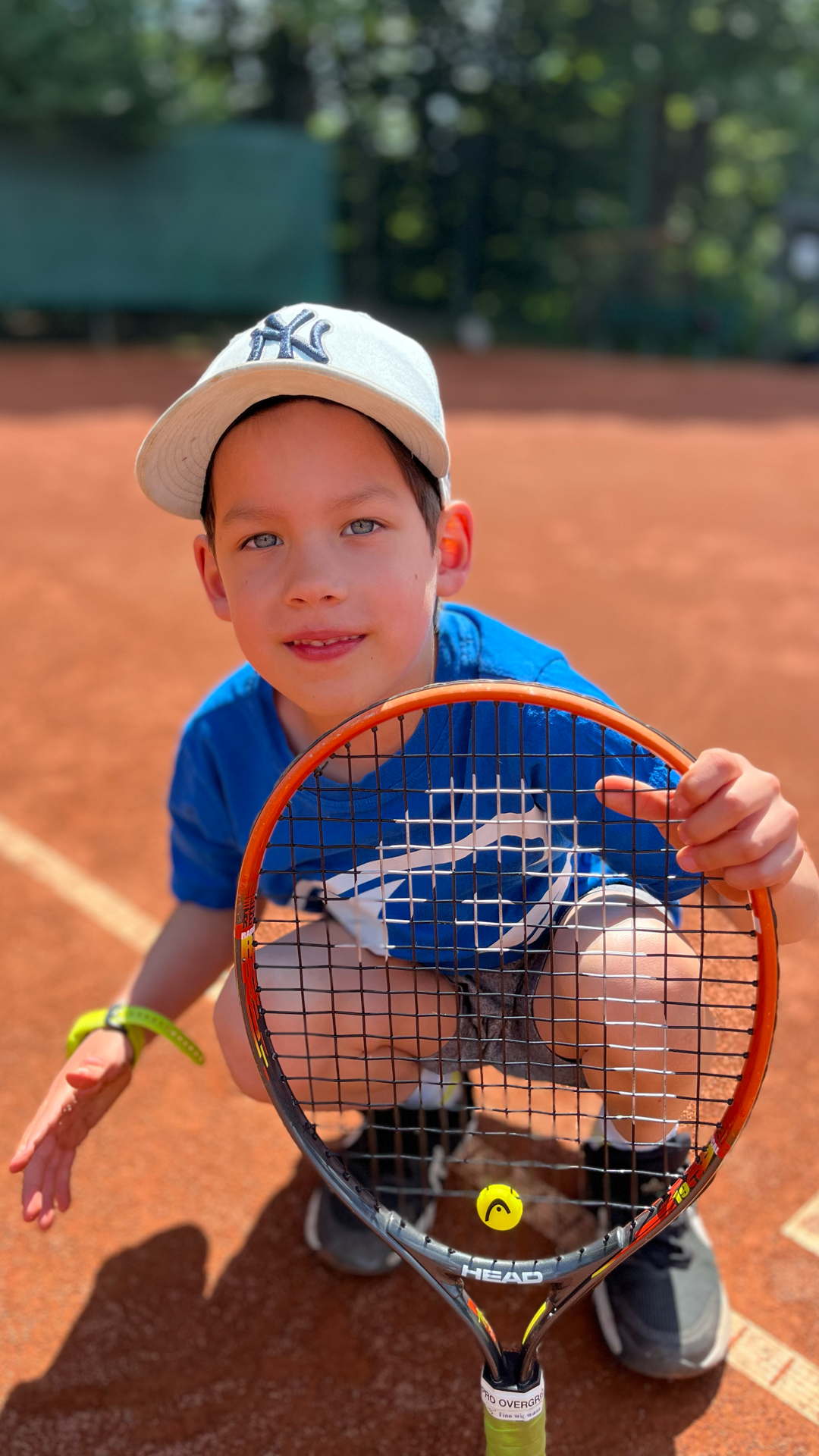kid-playing-tennis-training-happy